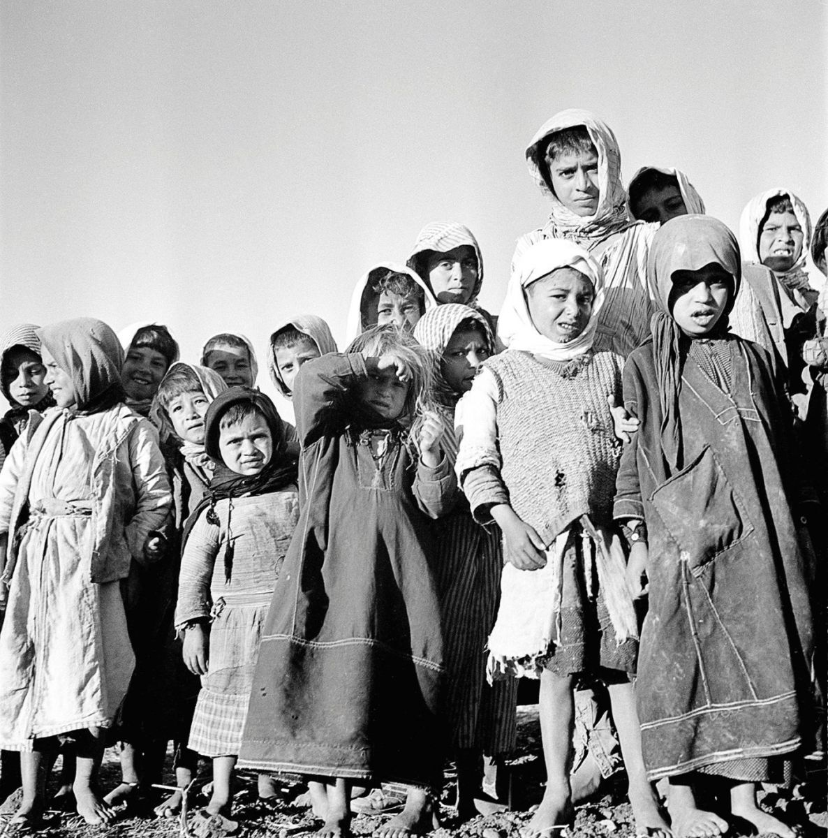 Palestinian children awaiting distribution of milk by UNICEF at the Nazareth Franciscan Sisters’ convent, on January 1, 1950. AW / UN Photo